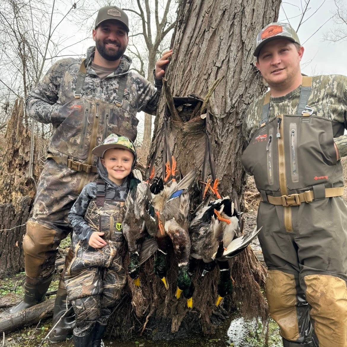 Family with hunted ducks. Waterfowl guide service, ultimate duck hunting experience in Northeast Texas and Southeast Oklahoma, Red River Duck Hunting Guide.